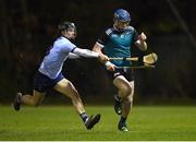 26 January 2023; Conor Drennan of Maynooth University is tackled by Séamus Fenton of UCD during the HE GAA Fitzgibbon Cup Round 2 match between Maynooth University and University College Dublin at the Maynooth University North Campus in Kildare. Photo by Tyler Miller/Sportsfile