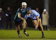 26 January 2023; Dara Purcell of UCD is tackled by Colm Fogarty of Maynooth University during the HE GAA Fitzgibbon Cup Round 2 match between Maynooth University and University College Dublin at the Maynooth University North Campus in Kildare. Photo by Tyler Miller/Sportsfile