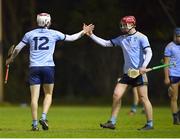 26 January 2023; Dónal O'Shea, left, and Liam Murphy of UCD shake hands after their side's victory in the HE GAA Fitzgibbon Cup Round 2 match between Maynooth University and University College Dublin at the Maynooth University North Campus in Kildare. Photo by Tyler Miller/Sportsfile