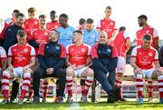 27 January 2023; Players and staff, including assistant manager Jon Daly, middle row, manager Tim Clancy, second from left, Joe Redmond and technical director Alan Mathews wait for their squad photograph to be taken during a St Patrick's Athletic squad portrait session at Richmond Park in Dublin. Photo by Stephen McCarthy/Sportsfile