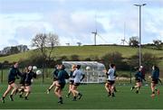28 January 2023; A general view of windmills in the distance as Kerry players warm-up before the 2023 Lidl Ladies National Football League Division 1 Round 2 match between Mayo and Kerry at the Connacht Centre of Excellence in Bekan, Mayo. Photo by Piaras Ó Mídheach/Sportsfile