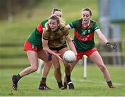 28 January 2023; Niamh Carmody of Kerry in action against Lucy Wallace, left, and Maria Cannon of Mayo during the 2023 Lidl Ladies National Football League Division 1 Round 2 match between Mayo and Kerry at the NUI Galway Connacht GAA Centre of Excellence in Bekan, Mayo. Photo by Piaras Ó Mídheach/Sportsfile