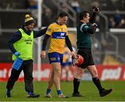 15 January 2023; Darragh Lohan of Clare leaves the pitch with an injury during the Co-Op Superstores Munster Hurling League Group 1 match between Clare and Waterford at Cusack Park in Ennis, Clare. Photo by Brendan Moran/Sportsfile