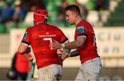 28 January 2023;  Shane Daly of Munster congratulates teammate John Hodnett of Munster after he scored their side's third try during the United Rugby Championship match between Benetton and Munster at Stadio Monigo in Treviso, Italy. Photo by Roberto Bregani/Sportsfile
