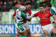 28 January 2023; Roman Salanoa of Munster in action against Rhyno Smith of Benetton during the United Rugby Championship match between Benetton and Munster at Stadio Monigo in Treviso, Italy. Photo by Roberto Bregani/Sportsfile