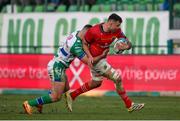 28 January 2023; Jack O’Sullivan of Munster in action against Filippo Drago of Benetton during the United Rugby Championship match between Benetton and Munster at Stadio Monigo in Treviso, Italy. Photo by Roberto Bregani/Sportsfile