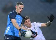 28 January 2023; Brian Fenton of Dublin on his way to scoring his side's first goal despite the attention of Kevin O’Callaghan of Kildare during the Allianz Football League Division 2 match between Dublin and Kildare at Croke Park in Dublin. Photo by Stephen McCarthy/Sportsfile
