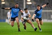 28 January 2023; Seán McMahon and John Small of Dublin challenge Jack Robinson of Kildare during the Allianz Football League Division 2 match between Dublin and Kildare at Croke Park in Dublin. Photo by Stephen Marken/Sportsfile