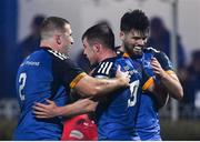 28 January 2023; Luke McGrath of Leinster, 9, celebrates with teammates John McKee and Harry Byrne after scoring his side's second try during the United Rugby Championship match between Leinster and Cardiff at RDS Arena in Dublin. Photo by Harry Murphy/Sportsfile