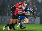 28 January 2023; John McKee of Leinster is tackled by Seb Davies, left, and Ben Thomas of Cardiff during the United Rugby Championship match between Leinster and Cardiff at RDS Arena in Dublin. Photo by Harry Murphy/Sportsfile