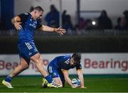 28 January 2023; Luke McGrath of Leinster celebrates with teammate John McKee after scoring his side's third try during the United Rugby Championship match between Leinster and Cardiff at RDS Arena in Dublin. Photo by Harry Murphy/Sportsfile
