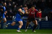 28 January 2023; Liam Turner of Leinster is tackled by Ben Thomas of Cardiff on his way to scoring his side's sixth try during the United Rugby Championship match between Leinster and Cardiff at RDS Arena in Dublin. Photo by Ben McShane/Sportsfile