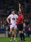 28 January 2023; Kevin O’Callaghan of Kildare is shown a yellow card by referee Brendan Griffin during the Allianz Football League Division 2 match between Dublin and Kildare at Croke Park in Dublin. Photo by Stephen McCarthy/Sportsfile