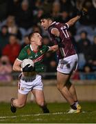 28 January 2023; Ryan O'Donoghue of Mayo is fouled by Neil Mulcahy of Galway during the Allianz Football League Division 1 match between Mayo and Galway at Hastings Insurance MacHale Park in Castlebar, Mayo. Photo by Piaras Ó Mídheach/Sportsfile