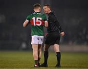 28 January 2023; Referee Joe McQuillan in conversation with Ryan O'Donoghue of Mayo during the Allianz Football League Division 1 match between Mayo and Galway at Hastings Insurance MacHale Park in Castlebar, Mayo. Photo by Piaras Ó Mídheach/Sportsfile