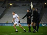 28 January 2023; Jack Sargent of Kildare comes onto the pitch during a substitution as linesman David Gough holds his flag in the air during the Allianz Football League Division 2 match between Dublin and Kildare at Croke Park in Dublin. Photo by Stephen McCarthy/Sportsfile