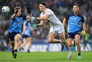 28 January 2023; Mick O’Grady of Kildare in action against Cian Murphy, left, and Cormac Costello of Dublin during the Allianz Football League Division 2 match between Dublin and Kildare at Croke Park in Dublin. Photo by Stephen Marken/Sportsfile