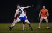 28 January 2023; Stephen O'Hanlon of Monaghan in action against Tiernan Kelly of Armagh during the Allianz Football League Division 1 match between Monaghan and Armagh at St Mary's Park in Castleblayney, Monaghan. Photo by Ramsey Cardy/Sportsfile