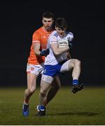 28 January 2023; Stephen O'Hanlon of Monaghan in action against Tiernan Kelly of Armagh during the Allianz Football League Division 1 match between Monaghan and Armagh at St Mary's Park in Castleblayney, Monaghan. Photo by Ramsey Cardy/Sportsfile