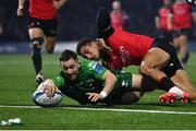 28 January 2023; Caolin Blade of Connacht scores his side's fifth try, despite the tackle of Emirates Lions' Jordan Hendrikse, during the United Rugby Championship match between Connacht and Emirates Lions at The Sportsground in Galway. Photo by Seb Daly/Sportsfile