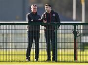 27 January 2023; Republic of Ireland manager Stephen Kenny, left, with Dundalk Head of Football Operations Brian Gartland during the Pre-Season Friendly match between Cork City and Dundalk at the FAI National Training Centre in Abbotstown, Dublin. Photo by Ben McShane/Sportsfile