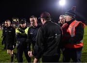 28 January 2023; Referee Joe McQuillan leaves the pitch alongside a member of An Garda Síochána after the drawn Allianz Football League Division 1 match between Mayo and Galway at Hastings Insurance MacHale Park in Castlebar, Mayo. Photo by Piaras Ó Mídheach/Sportsfile