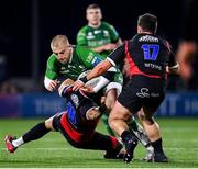 28 January 2023; Jordan Duggan of Connacht is tackled by Michael van Vuuren and Morgan Naude of Emirates Lions during the United Rugby Championship match between Connacht and Emirates Lions at The Sportsground in Galway. Photo by Seb Daly/Sportsfile