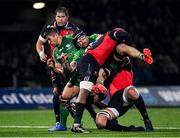28 January 2023; Conor Oliver of Connacht is tackled by Sibusiso Sangweni and Pieter Jansen van Vuren of Emirates Lions during the United Rugby Championship match between Connacht and Emirates Lions at The Sportsground in Galway. Photo by Seb Daly/Sportsfile