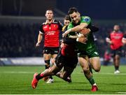 28 January 2023; Caolin Blade of Connacht is tackled by Jordan Hendrikse of Emirates Lions on his way to scoring his side's fifth try during the United Rugby Championship match between Connacht and Emirates Lions at The Sportsground in Galway. Photo by Seb Daly/Sportsfile