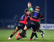 28 January 2023; Cathal Forde of Connacht is tackled by Jordan Hendrikse, left, and PJ Botha of Emirates Lions during the United Rugby Championship match between Connacht and Emirates Lions at The Sportsground in Galway. Photo by Seb Daly/Sportsfile