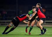 28 January 2023; Tom Farrell of Connacht is tackled by Darrien Landsberg, left, and JP Smith of Emirates Lions during the United Rugby Championship match between Connacht and Emirates Lions at The Sportsground in Galway. Photo by Seb Daly/Sportsfile