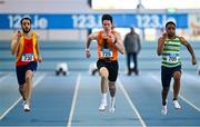 29 January 2023; Athletes, from left, Joseph Finnegan Murphy of Tallaght AC, Dublin, Padraic Hassett of Nenagh Olympic AC, Tipperary, and Lemar Lucciamo of Castlegar AC, Galway, competing in the Men's Senior 60m during the 123.ie AAI Indoor Games at the TUS International arena in Athlone, Westmeath. Photo by Ben McShane/Sportsfile