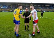 29 January 2023; Team captains Brian Stack of Roscommon and Padraig Hampsey of Tyrone shake hands, under the watchful eye of referee David Coldrick, before the Allianz Football League Division 1 match between Roscommon and Tyrone at Dr Hyde Park in Roscommon. Photo by Seb Daly/Sportsfile