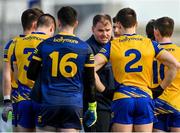 29 January 2023; Roscommon manager Davy Burke talks to his players before the Allianz Football League Division 1 match between Roscommon and Tyrone at Dr Hyde Park in Roscommon. Photo by Seb Daly/Sportsfile