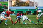 28 January 2023; Alex Kendellen of Munster in action against Henry Time-Stowers of Benetton during the United Rugby Championship match between Benetton and Munster at Stadio Monigo in Treviso, Italy. Photo by Roberto Bregani/Sportsfile