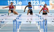 29 January 2023; Athletes, from left, Lucy Mc Glynn of Tír Chonaill AC, Donegal, Arabella Adekoya of St L. O'Toole AC, Carlow, and Rachel Gallagher of Tír Chonaill AC, Donegal, competing in the Women's Senior 60m Hurdles during the 123.ie AAI Indoor Games at the TUS International arena in Athlone, Westmeath. Photo by Ben McShane/Sportsfile