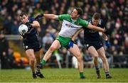 29 January 2023; Barry O'Sullivan, left, supported by Jason Foley in action against Hugh McFadden of Donegal during the Allianz Football League Division 1 match between Donegal and Kerry at MacCumhaill Park in Ballybofey, Donegal. Photo by Ramsey Cardy/Sportsfile