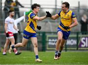 29 January 2023; Ben O’Carroll of Roscommon, left, celebrates with teammate Enda Smith after scoring their side's third goal during the Allianz Football League Division 1 match between Roscommon and Tyrone at Dr Hyde Park in Roscommon. Photo by Seb Daly/Sportsfile