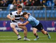 29 January 2023; Jack Dunne of Belvedere College is tackled by James Sherwin of St Michael's College during the Bank of Ireland Leinster Rugby Schools Senior Cup First Round match between St Michael’s College and Belvedere College at Energia Park in Dublin. Photo by Harry Murphy/Sportsfile
