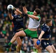 29 January 2023; Hugh McFadden of Donegal in action against Barry O'Sullivan, left, and Jason Foley of Kerry during the Allianz Football League Division 1 match between Donegal and Kerry at MacCumhaill Park in Ballybofey, Donegal. Photo by Ramsey Cardy/Sportsfile