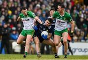 29 January 2023; Donal O'Sullivan of Kerry is tackled by Caolan McColgan, left, and Jason McGee of Donegal during the Allianz Football League Division 1 match between Donegal and Kerry at MacCumhaill Park in Ballybofey, Donegal. Photo by Ramsey Cardy/Sportsfile