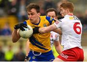 29 January 2023; Enda Smith of Roscommon in action against Peter Harte of Tyrone during the Allianz Football League Division 1 match between Roscommon and Tyrone at Dr Hyde Park in Roscommon. Photo by Seb Daly/Sportsfile