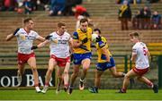 29 January 2023; Enda Smith of Roscommon in action against Peter Harte of Tyrone during the Allianz Football League Division 1 match between Roscommon and Tyrone at Dr Hyde Park in Roscommon. Photo by Seb Daly/Sportsfile