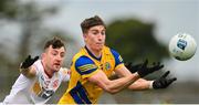 29 January 2023; Daire Cregg of Roscommon in action against Cormac Munroe of Tyrone during the Allianz Football League Division 1 match between Roscommon and Tyrone at Dr Hyde Park in Roscommon. Photo by Seb Daly/Sportsfile