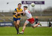 29 January 2023; Brian Stack of Roscommon in action against Mattie Donnelly of Tyrone during the Allianz Football League Division 1 match between Roscommon and Tyrone at Dr Hyde Park in Roscommon. Photo by Seb Daly/Sportsfile