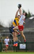 29 January 2023; Brian Kennedy of Tyrone in action against Keith Doyle of Roscommon during the Allianz Football League Division 1 match between Roscommon and Tyrone at Dr Hyde Park in Roscommon. Photo by Seb Daly/Sportsfile