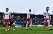 29 January 2023; Tyrone players, from left, Michael McKernan, goalkeeper Niall Morgan, Brian Kennedy, and Padraig Hampsey after conceding a third goal during the Allianz Football League Division 1 match between Roscommon and Tyrone at Dr Hyde Park in Roscommon. Photo by Seb Daly/Sportsfile