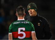 28 January 2023; Mayo selector Liam McHale speaks with Stephen Coen before the Allianz Football League Division 1 match between Mayo and Galway at Hastings Insurance MacHale Park in Castlebar, Mayo. Photo by Piaras Ó Mídheach/Sportsfile