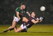 28 January 2023; Daniel O'Flaherty of Galway in action against Jordan Flynn of Mayo during the Allianz Football League Division 1 match between Mayo and Galway at Hastings Insurance MacHale Park in Castlebar, Mayo. Photo by Piaras Ó Mídheach/Sportsfile