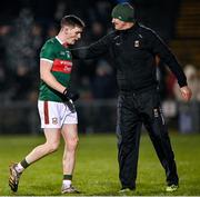 28 January 2023; James Carr of Mayo is greeted by Mayo selector Liam McHale as he is substituted during the Allianz Football League Division 1 match between Mayo and Galway at Hastings Insurance MacHale Park in Castlebar, Mayo. Photo by Piaras Ó Mídheach/Sportsfile